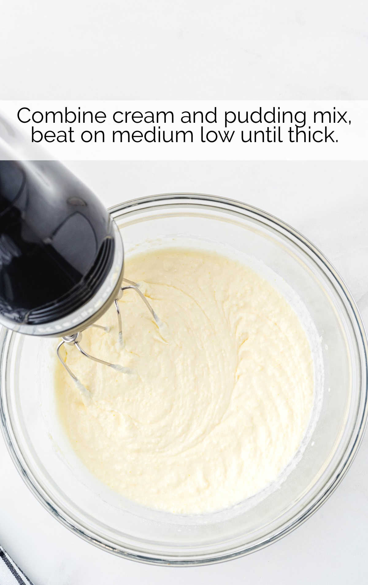 cream and pudding mix blended together in a bowl