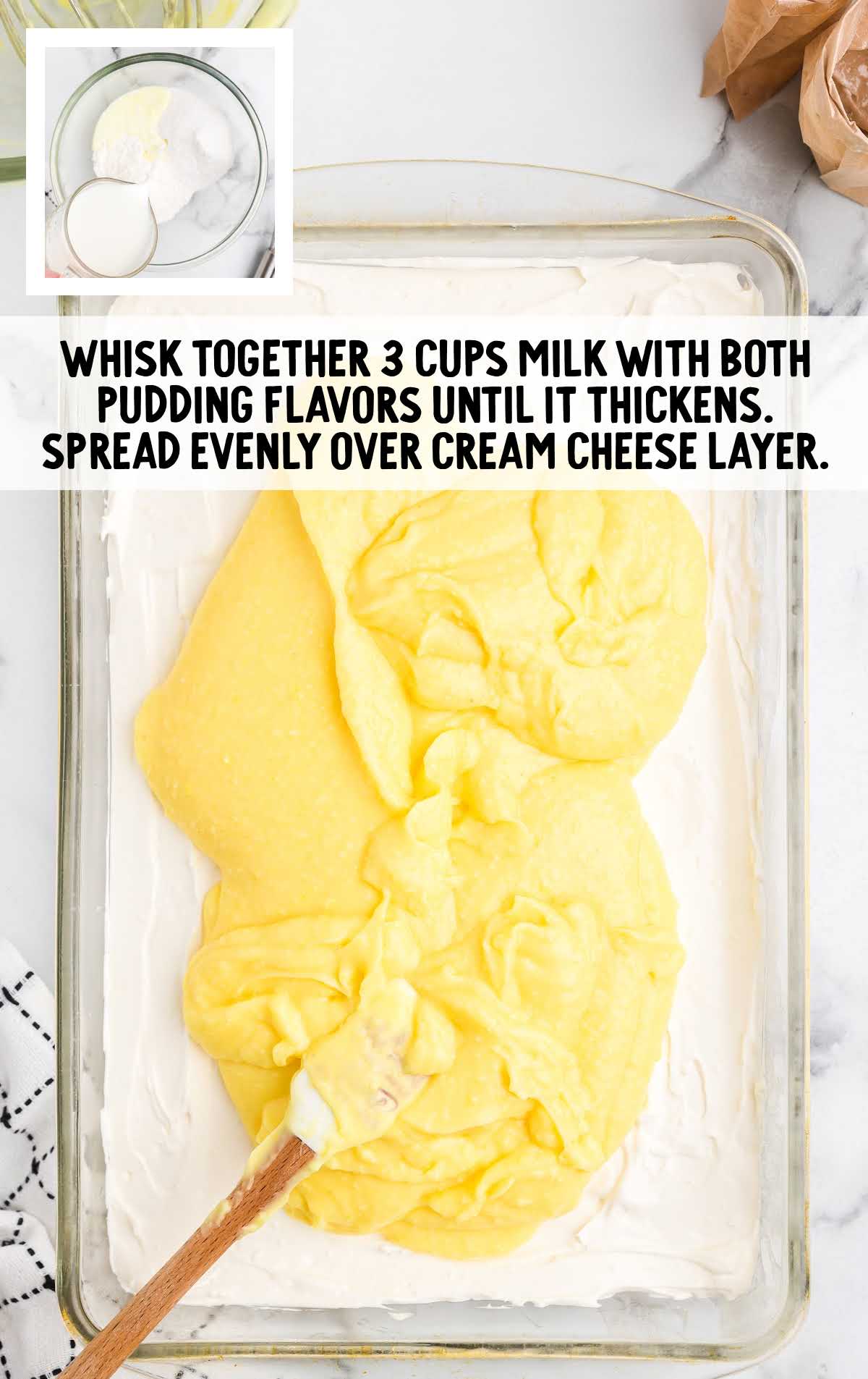 lemon ingredients combined in a bowl then spread on top of the cream cheese layer