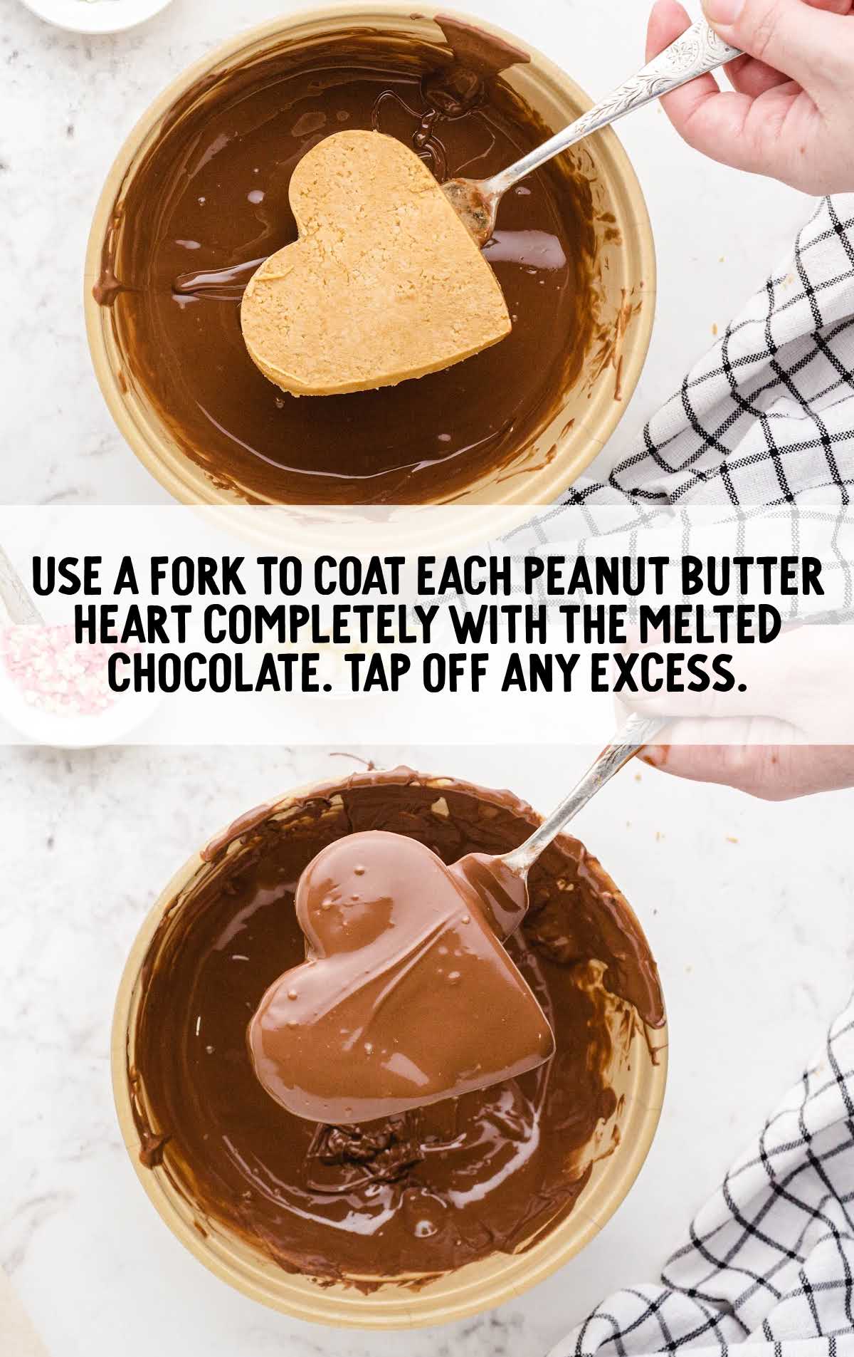 peanut butter heart dipped into a bowl of melted chocolate