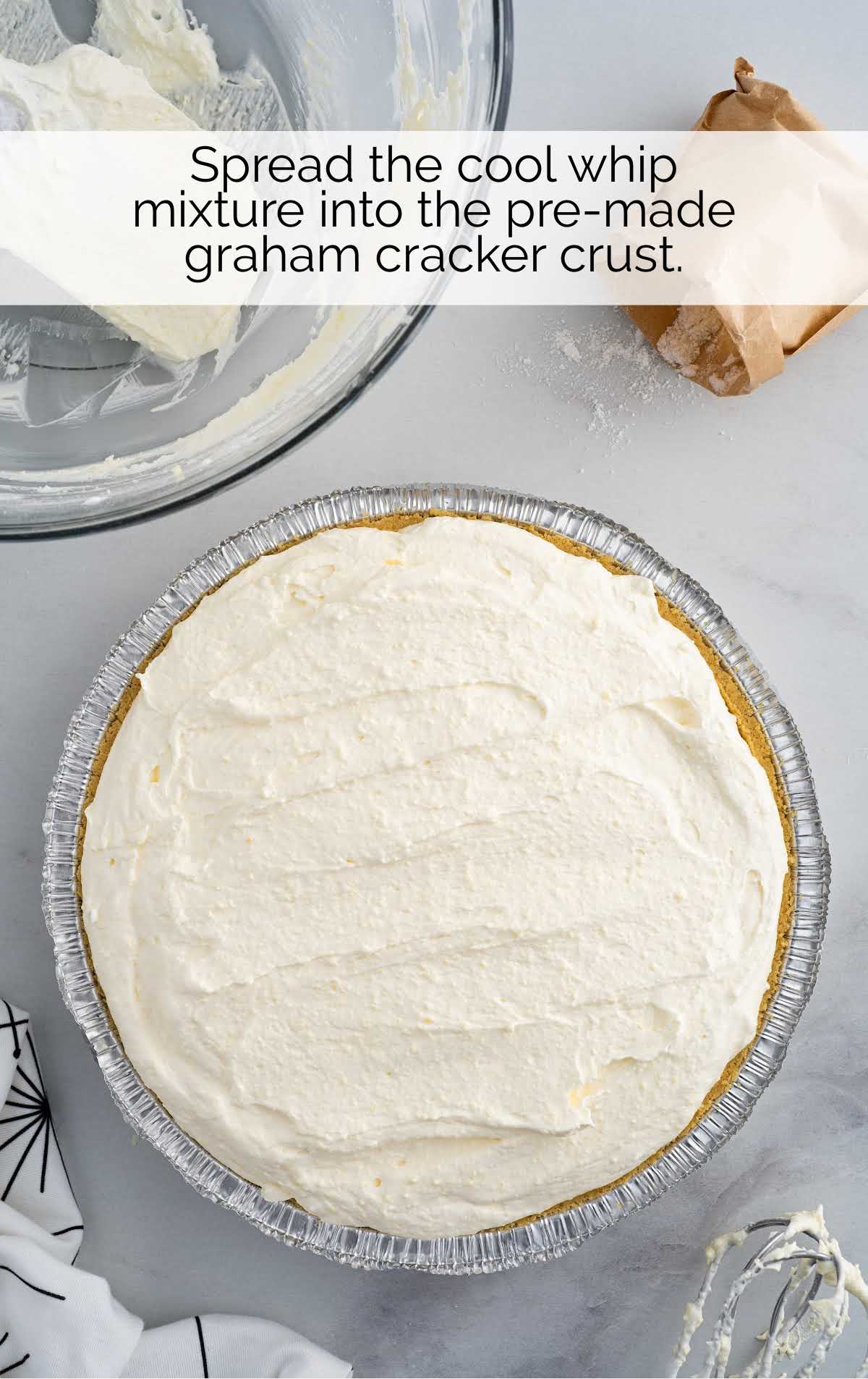 cool whip mixture spread into the pie crust