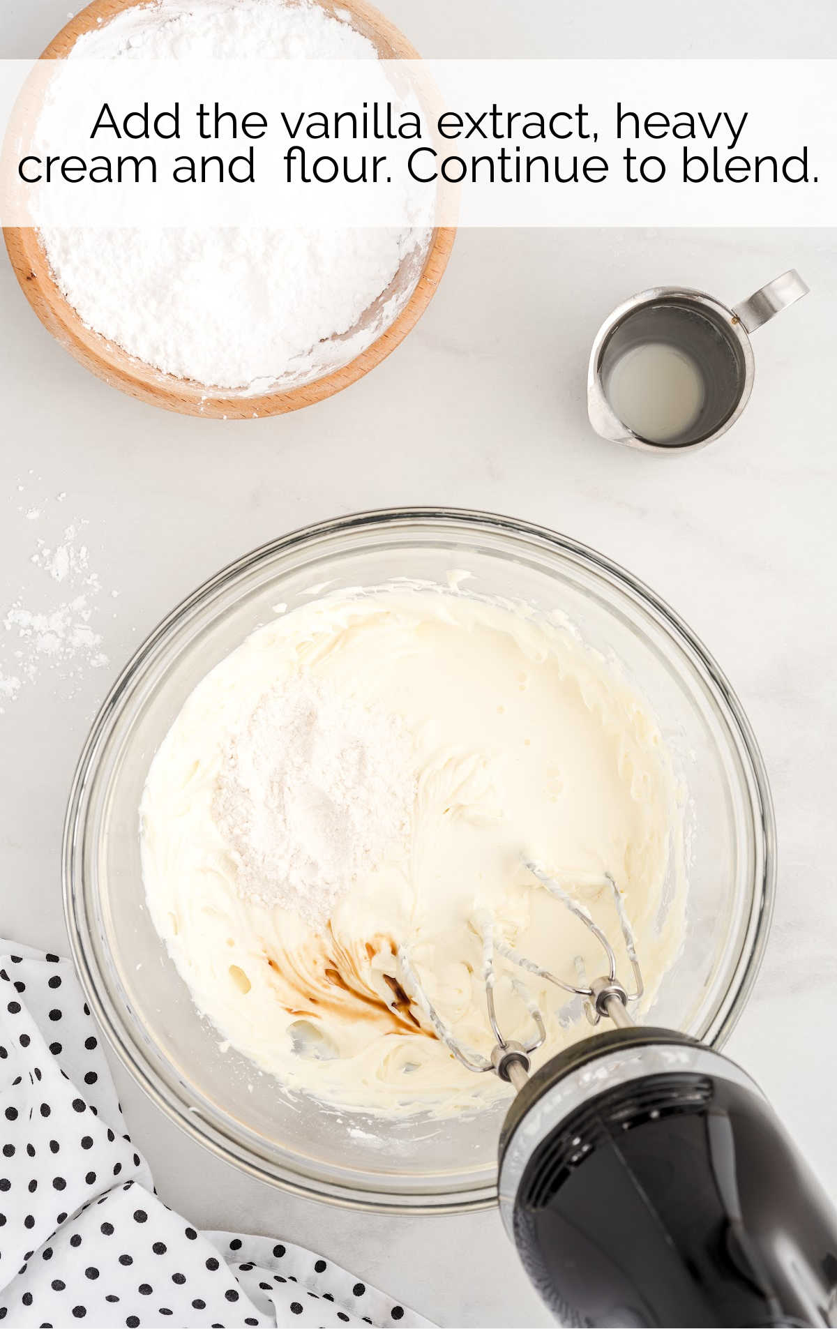 vanilla, heavy creamy and flour whisked into the cream cheese mixture