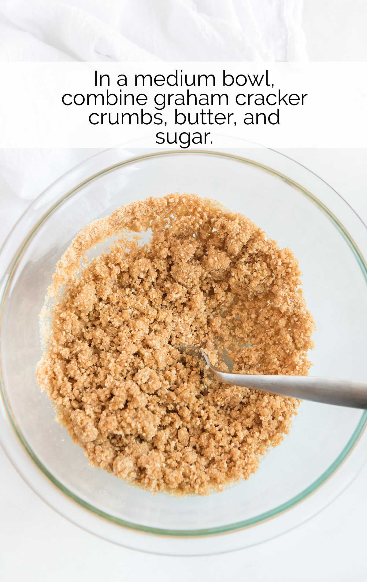graham cracker crumbs, butter, and sugar combined in a bowl