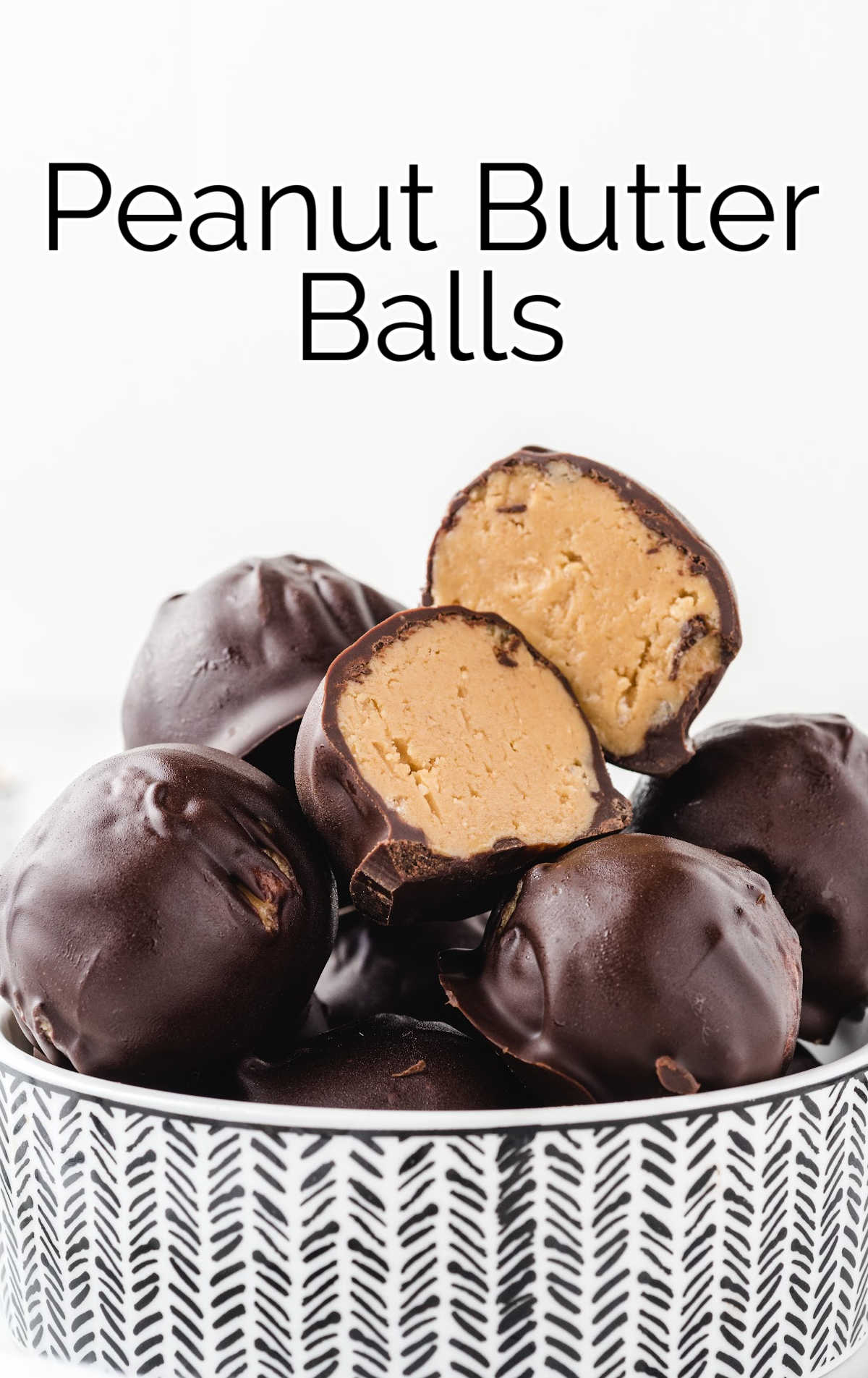 close up shot of Peanut Butter Balls stacked on top of each other in a bowl