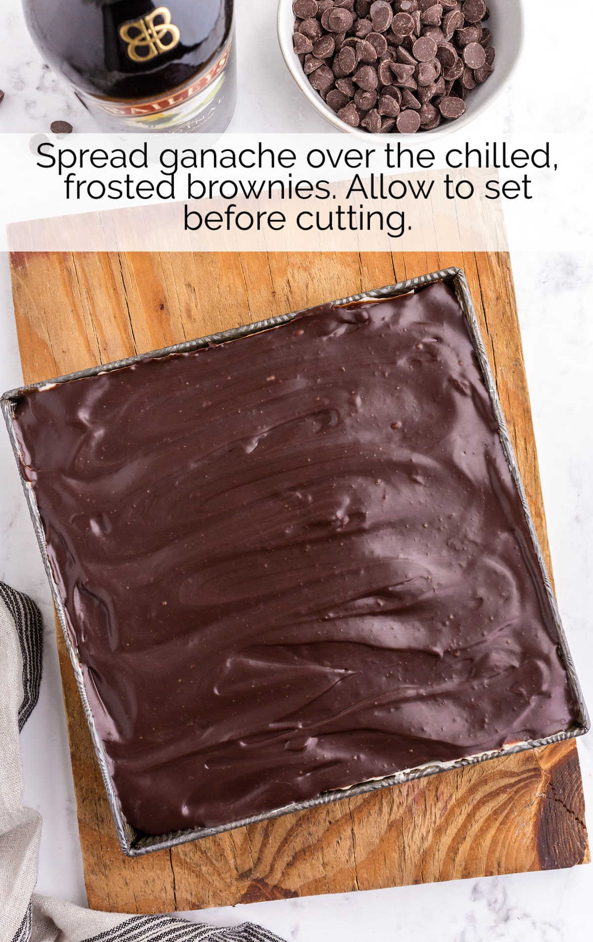 ganache spread over the chilled brownies