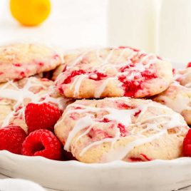 Lemon Raspberry Cookies with raspberry on a plate