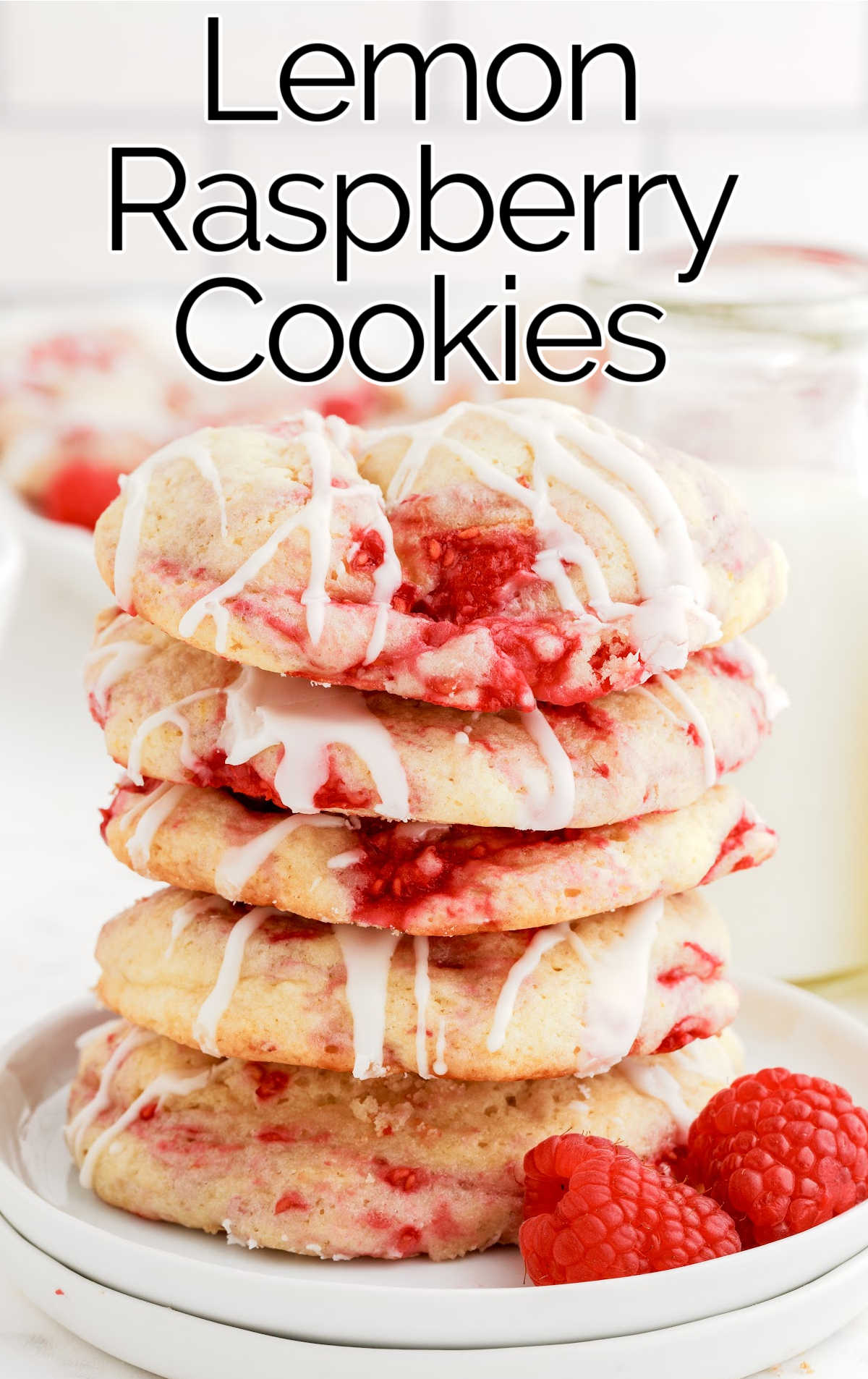 Lemon Raspberry Cookies stacked on top of each other on a plate