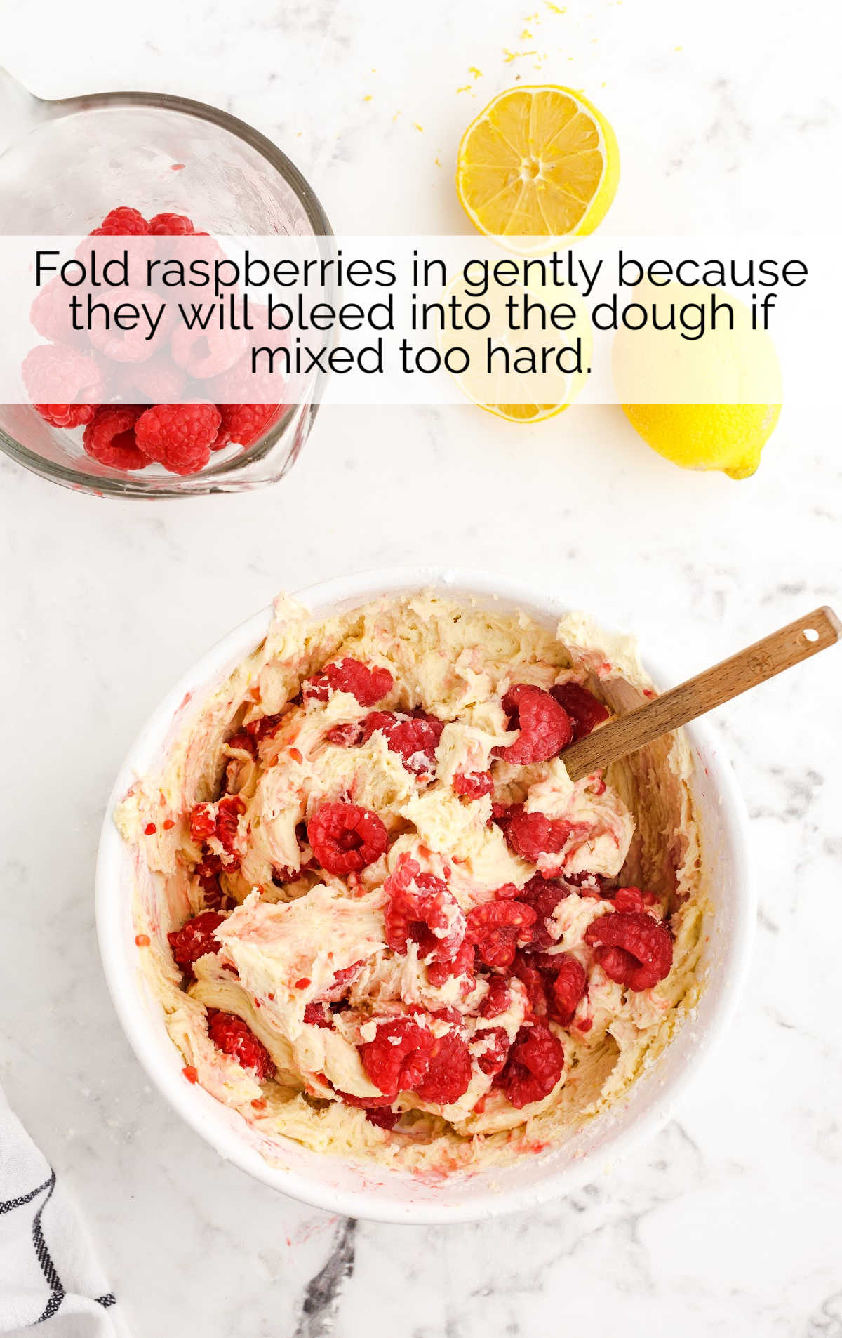 raspberries folded in a bowl