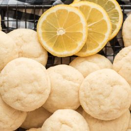 Overhead shot of Lemon Sugar Cookies piled on a cooling rack