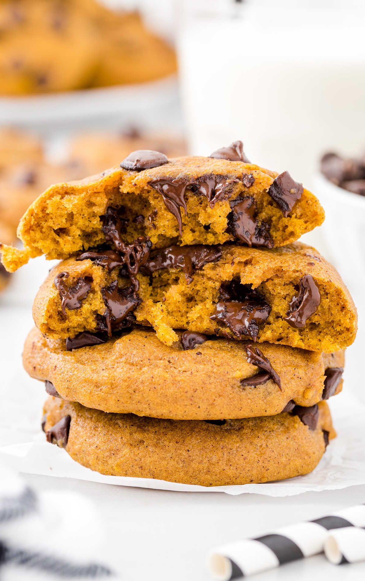 Pumpkin Chocolate Chip Cookies stacked on top of each other