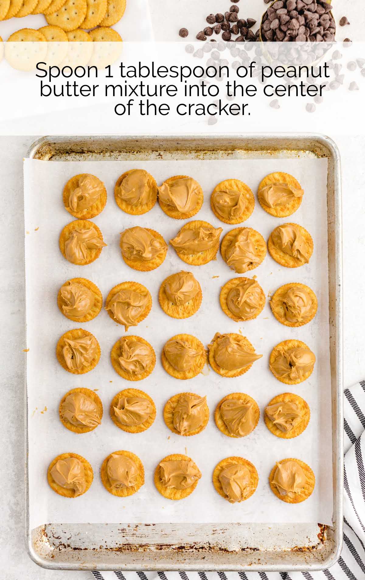 peanut butter placed on top of the cookies in a baking tray