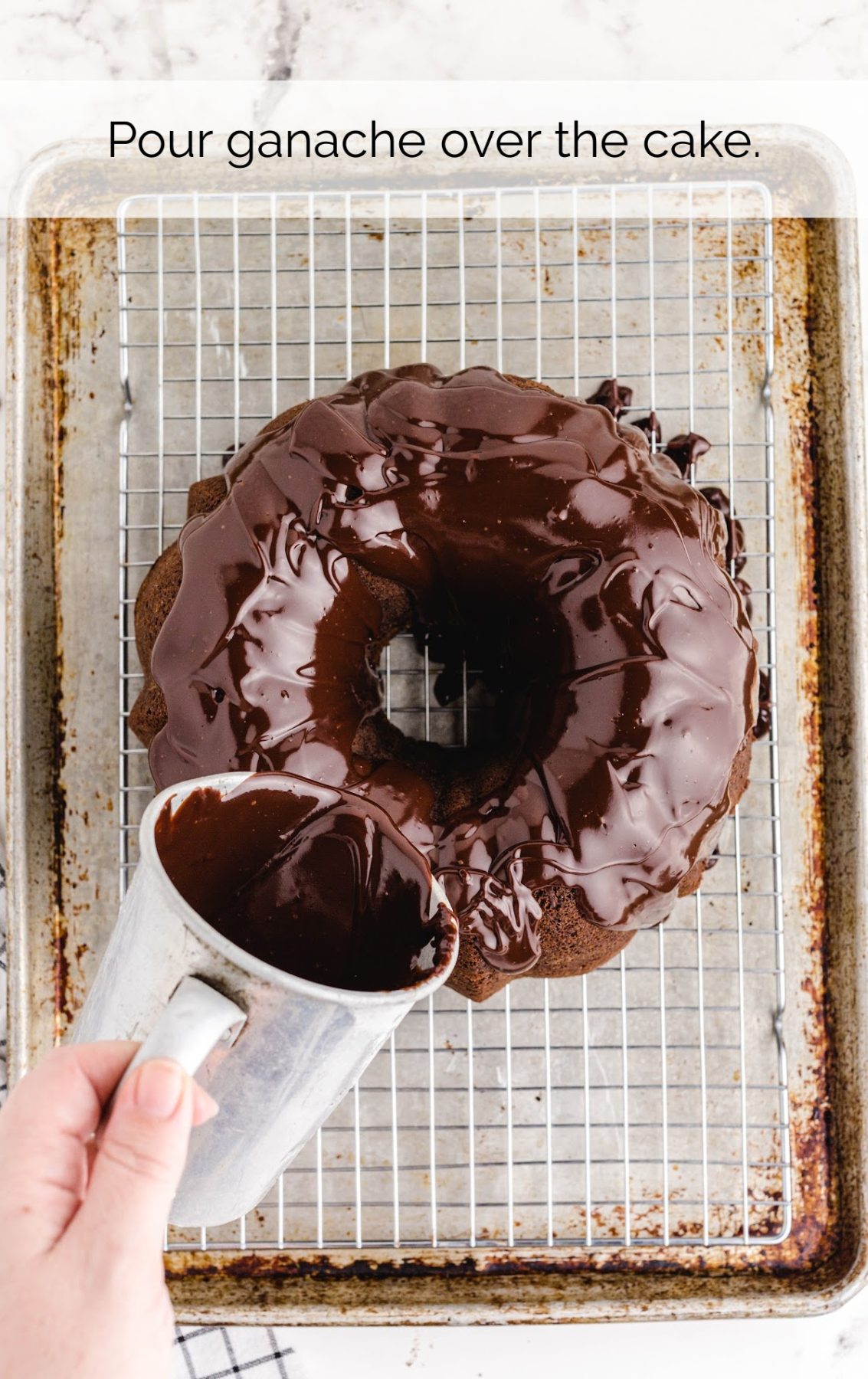 chocolate ganache poured over the cake