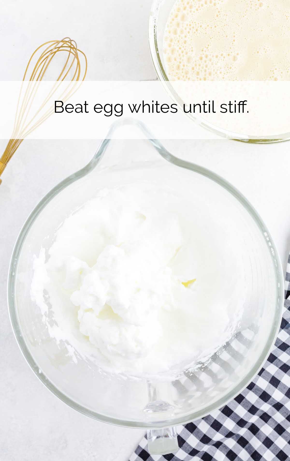egg white whisked in a cup