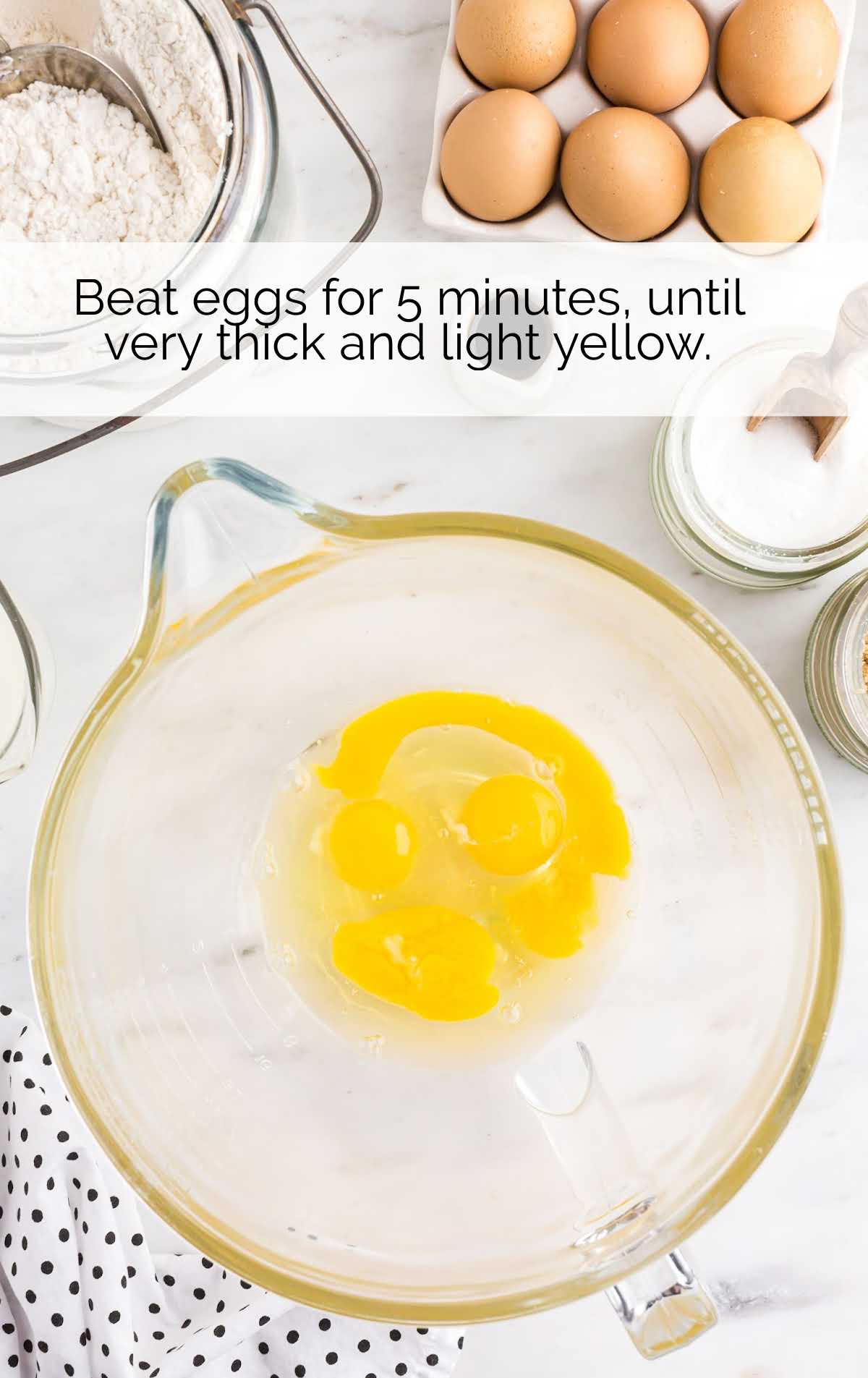 egg being whisked in a measuring cup