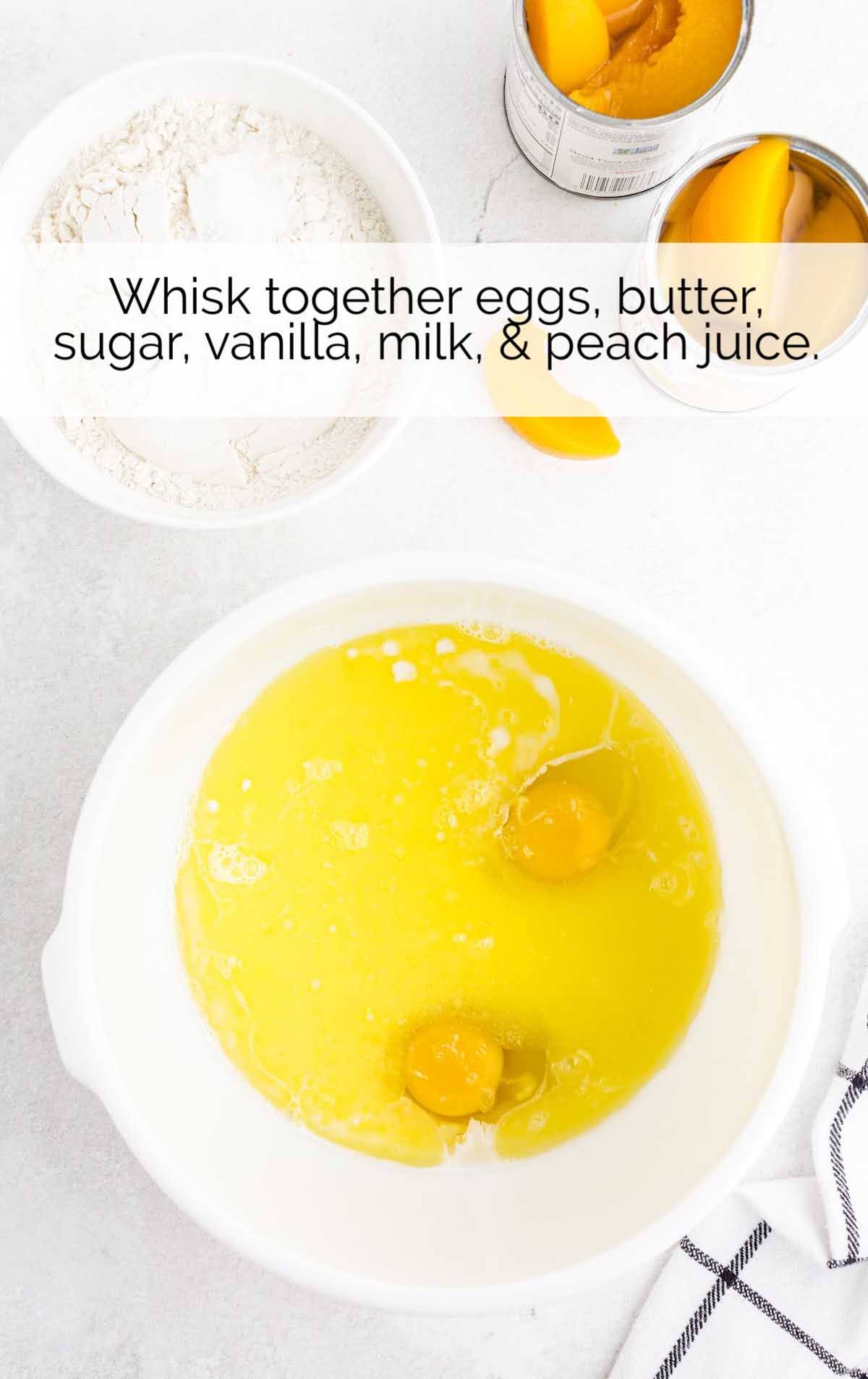 eggs, butter, sugar, vanilla, milk, and peach juice whisked together in a bowl