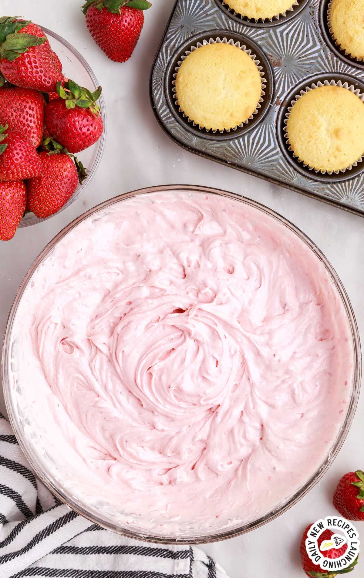 overhead shot of Strawberry Cream Cheese Frosting in a bowl