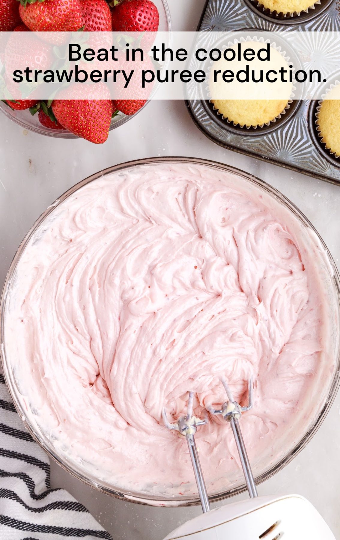 strawberry puree blended in a bowl with the cream cheese mixture