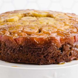 close up shot of Banana Upside Down Cake on a cake stand