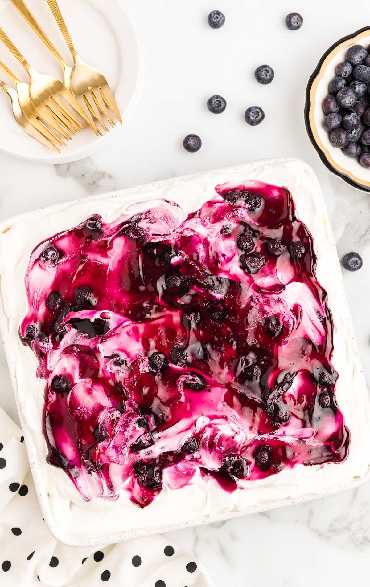 overhead shot of Blueberry Angel Food Cake in a baking dish
