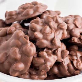 close up shot of Chocolate Peanut Clusters in a bowl