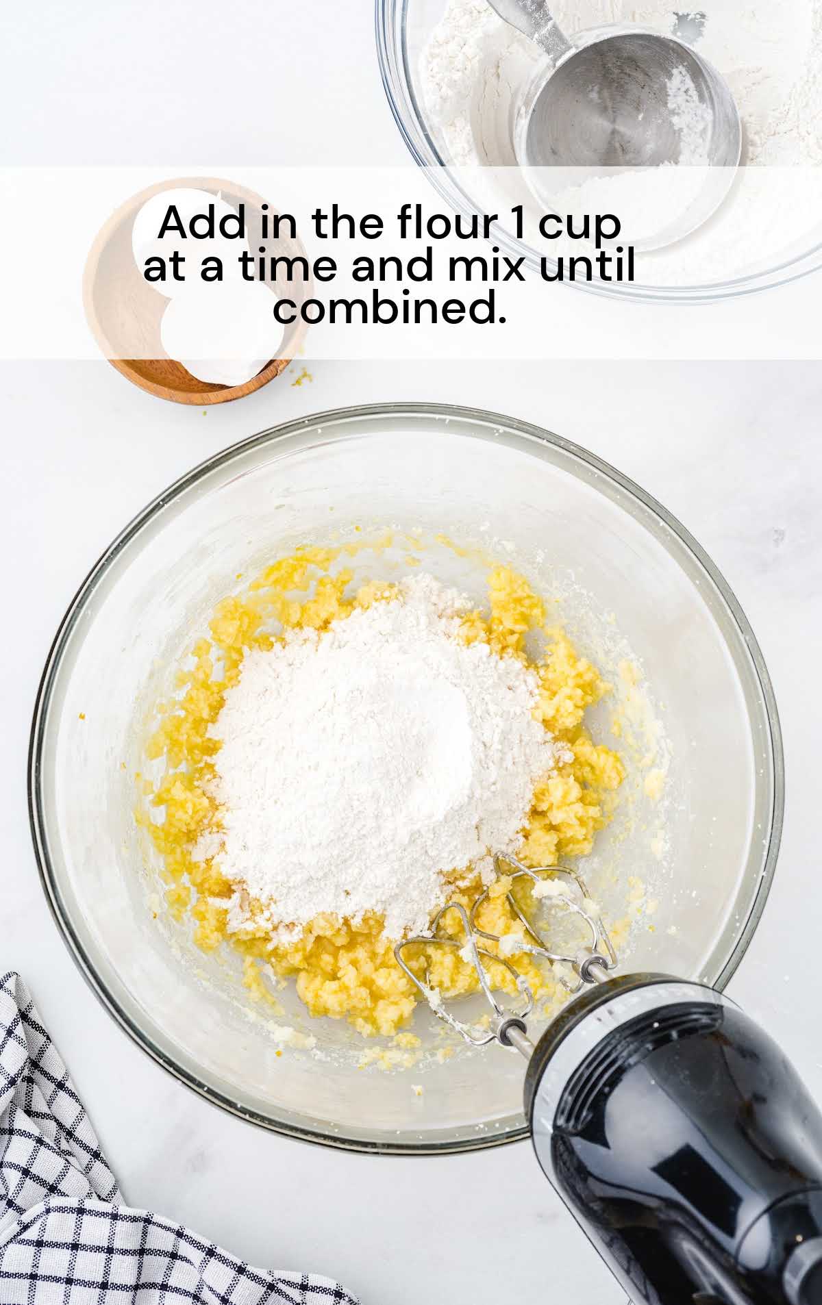 flour added to the egg mixture in a bowl and then blended