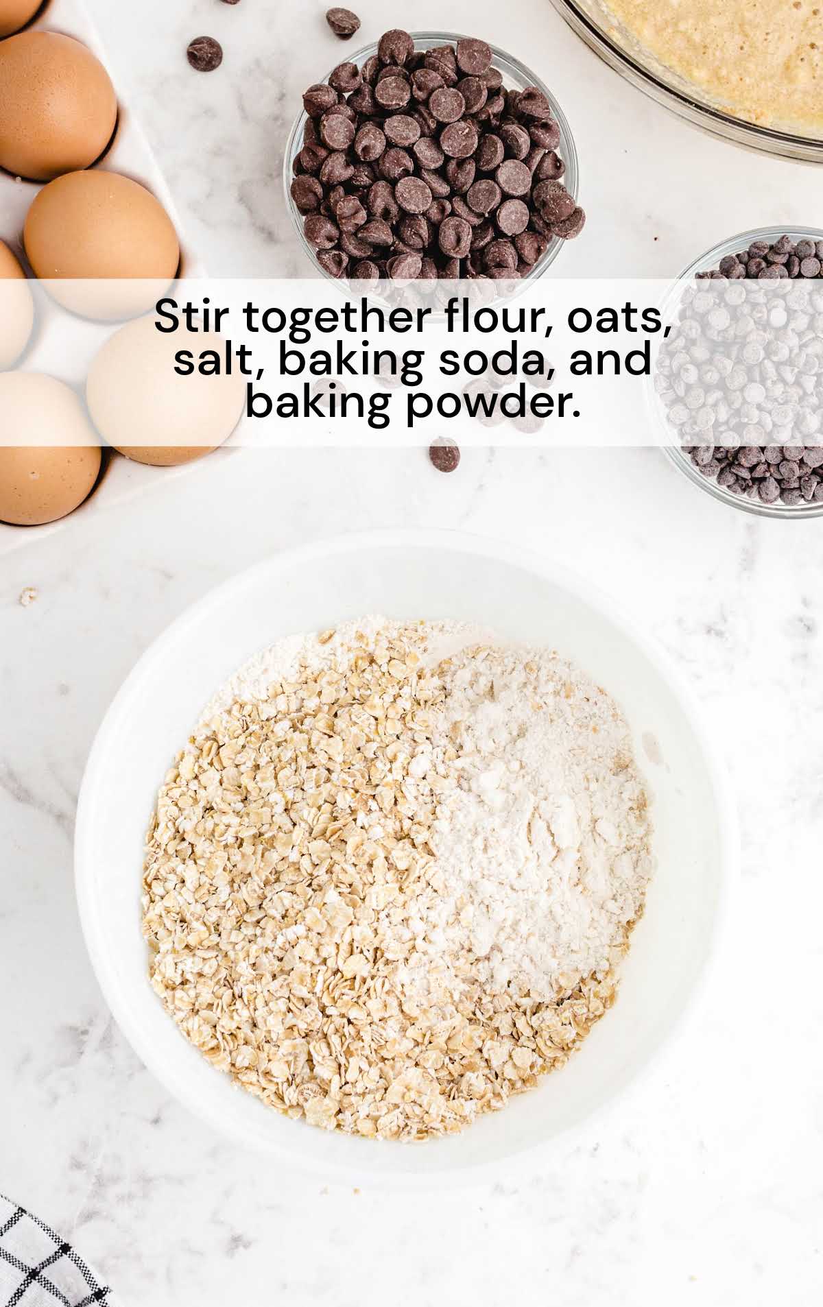 flour, oats, salt, baking soda, and baking powder stirred in a bowl