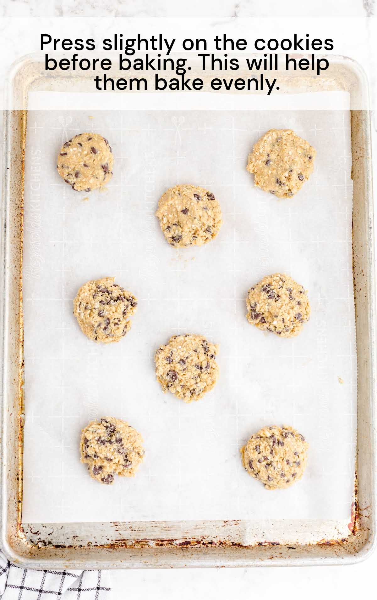 Oatmeal Chocolate Chip Cookies on a baking pan