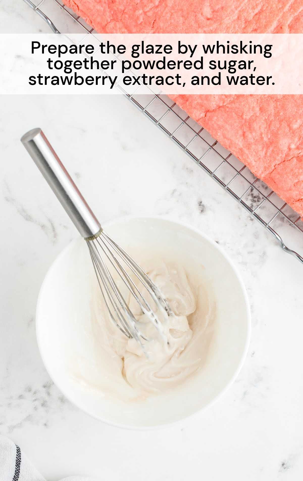 powdered sugar, strawberry extract and water whisked together in a bowl