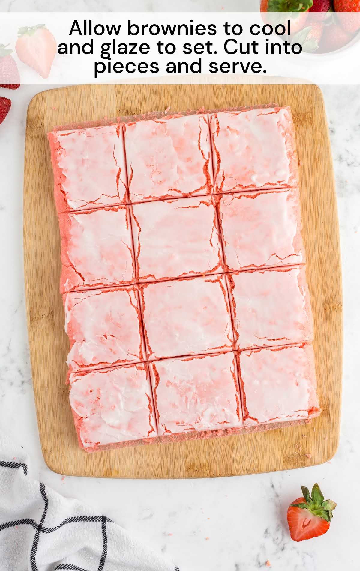 baked Strawberry Brownies on a wooden cutting board
