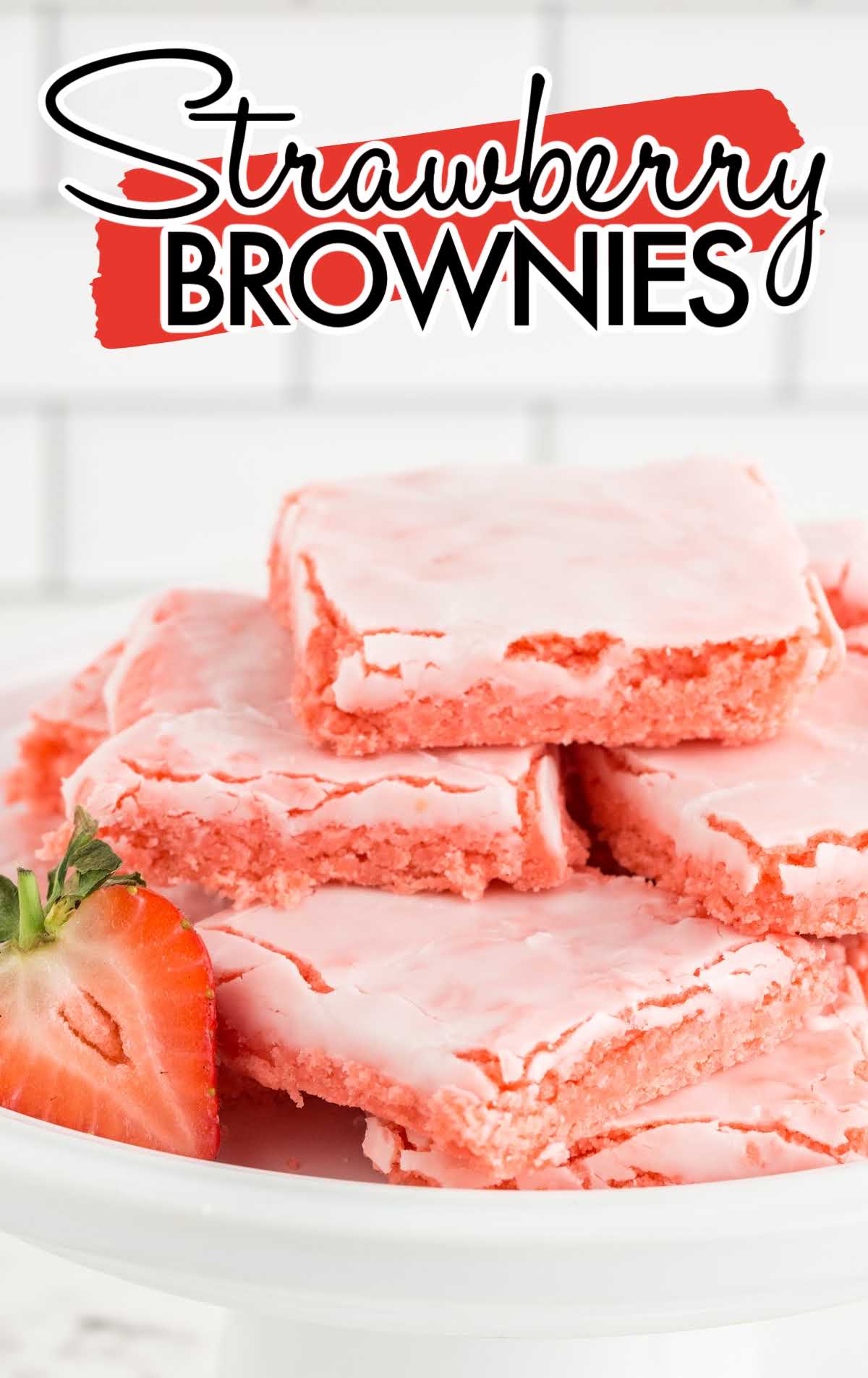 close up shot of Strawberry Brownies stacked on top of each other on a cake stand