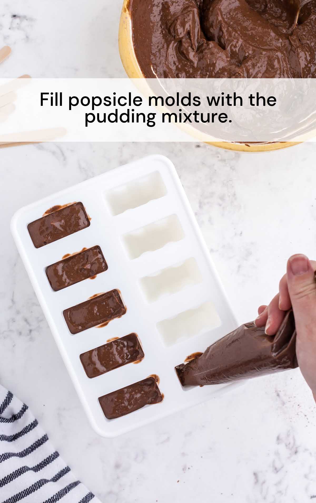 popsicle molds filled with pudding mixture