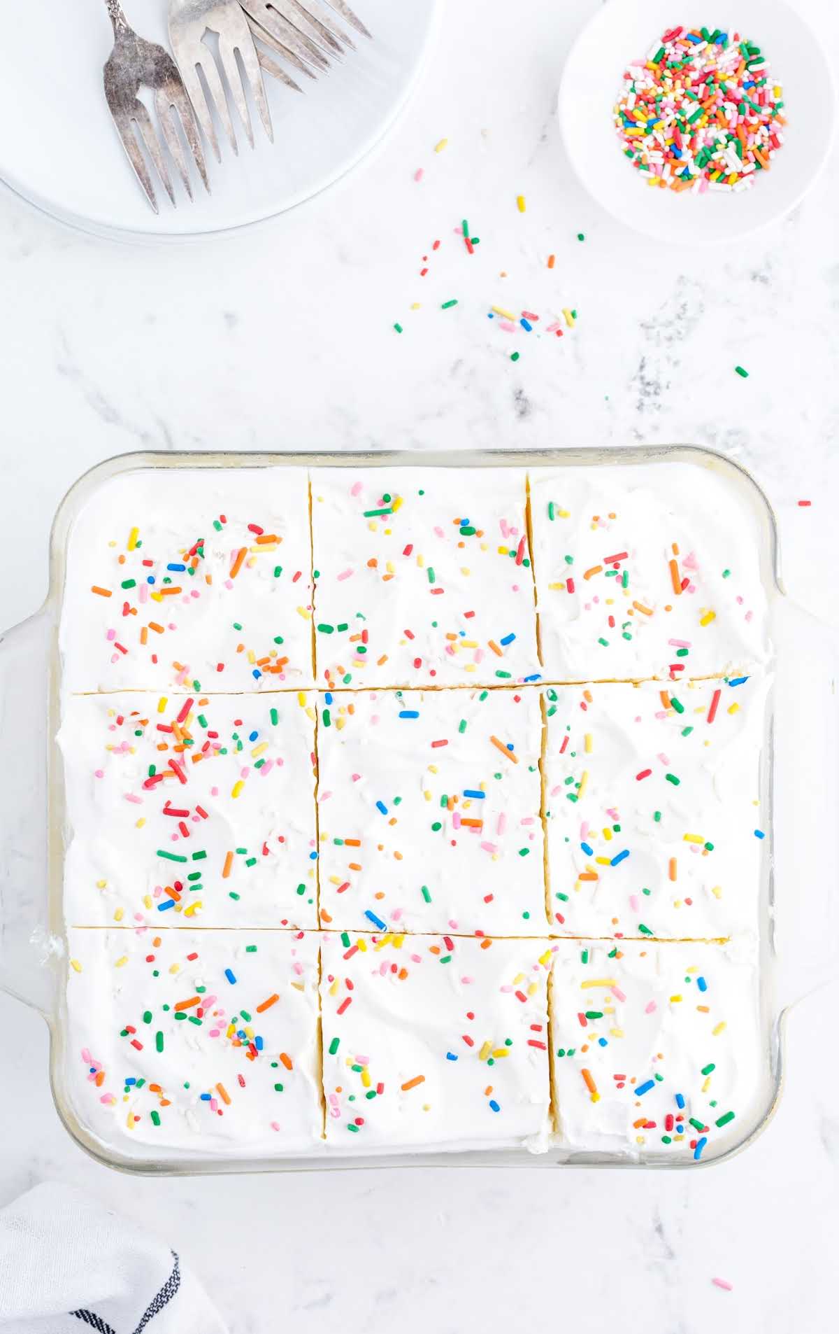 overhead shot of Birthday Cake Delight in a glass baking dish