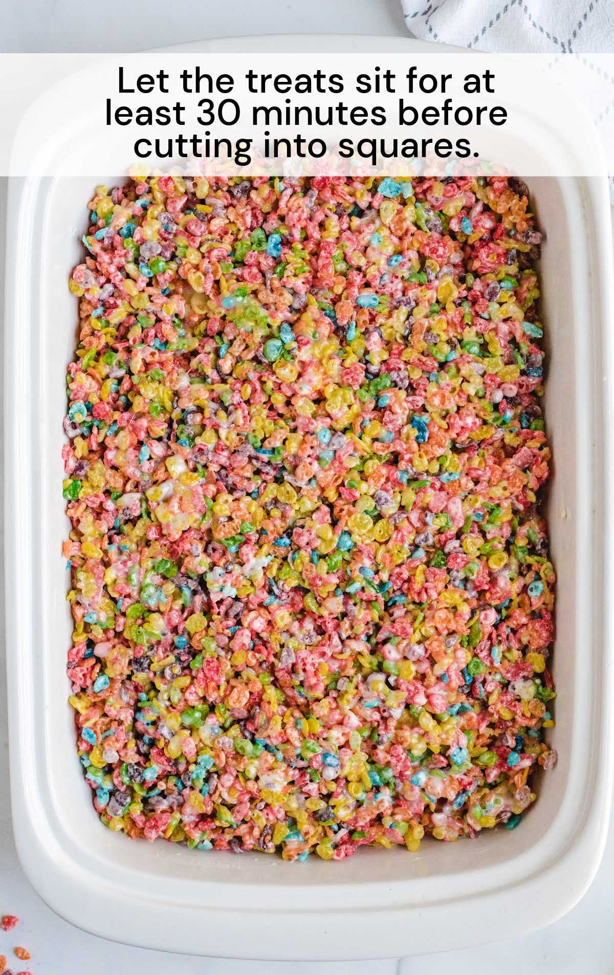 Fruity Pebbles Treats in a pan not cut into squares
