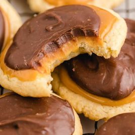 close up shot of Twix Cookies with one having a bite taken out of it