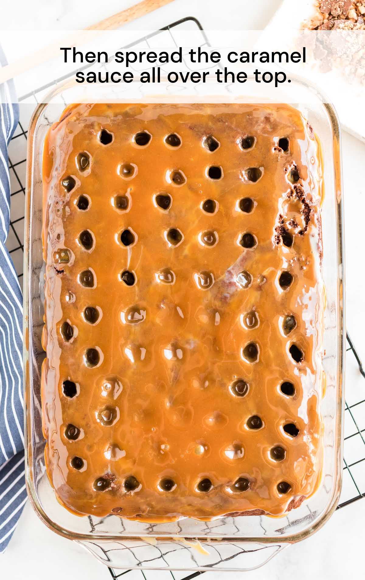 caramel sauce spread over the top in a baking dish